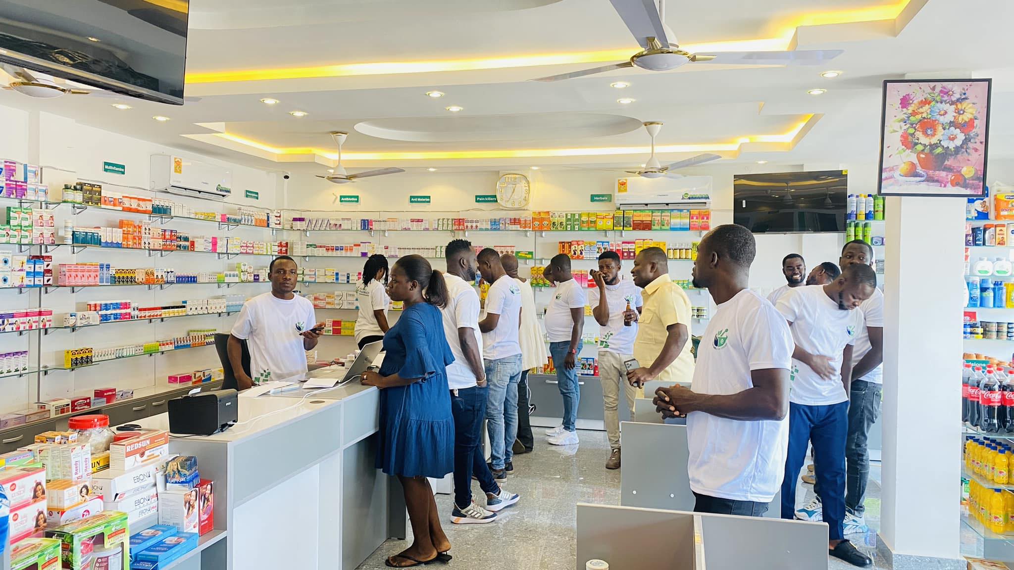 Professional Evanex pharmacist consulting a colleague on medications